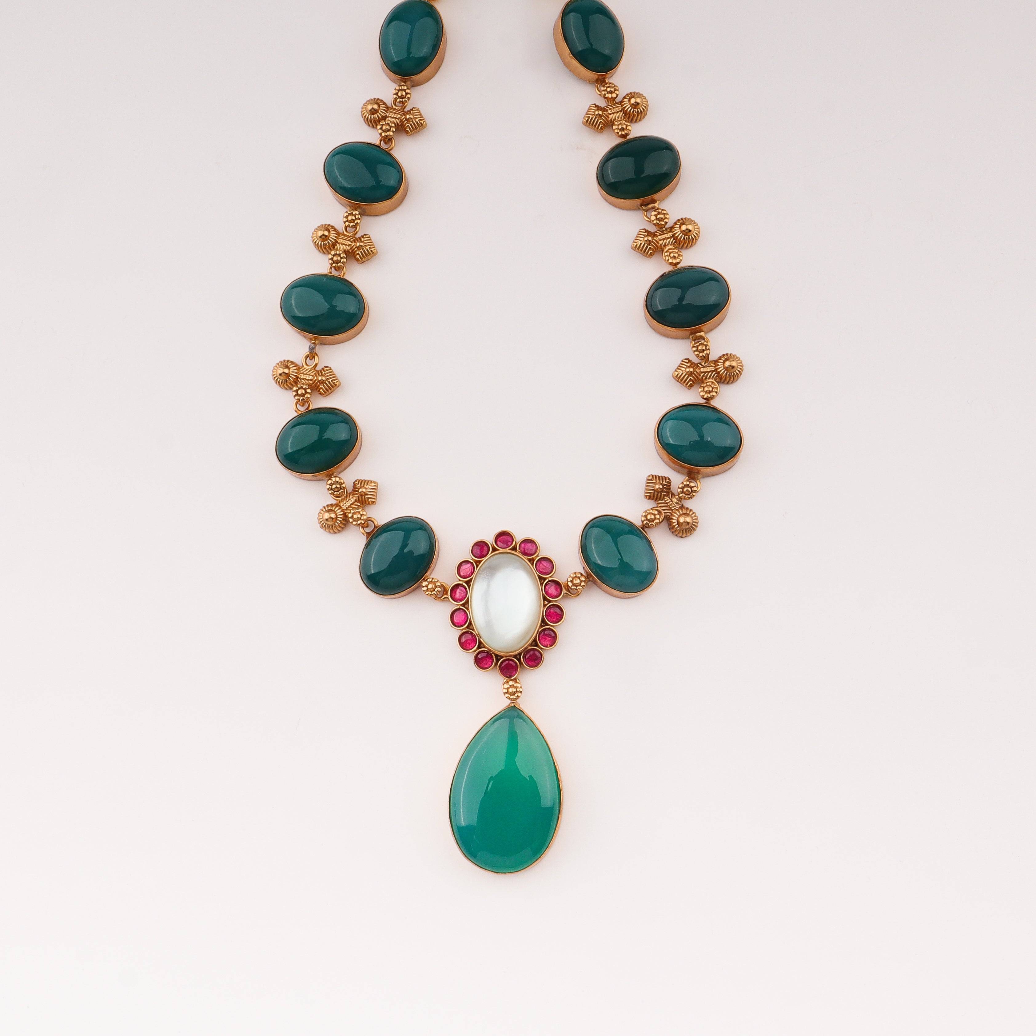 Close-up of 22K gold-plated fashion sets showcasing intricate detailing, fine craftsmanship, and rich 22K gold plating