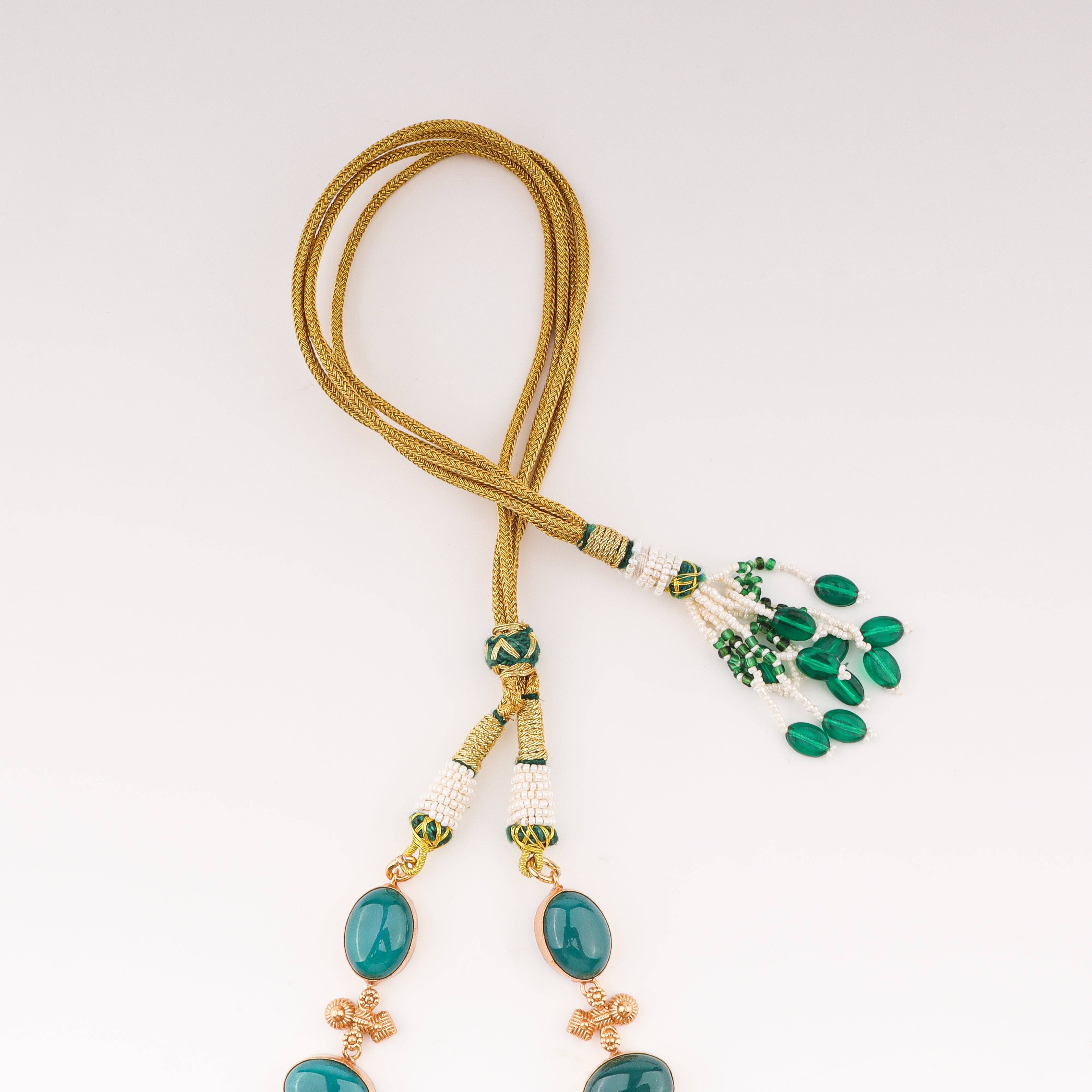 Angled view of 22K gold-plated fashion sets highlighting the coordinated design, elegant structure, and polished gold finish