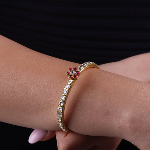 Model wearing 22K gold-plated fashion bangle (single) for a sophisticated and elegant jewelry look