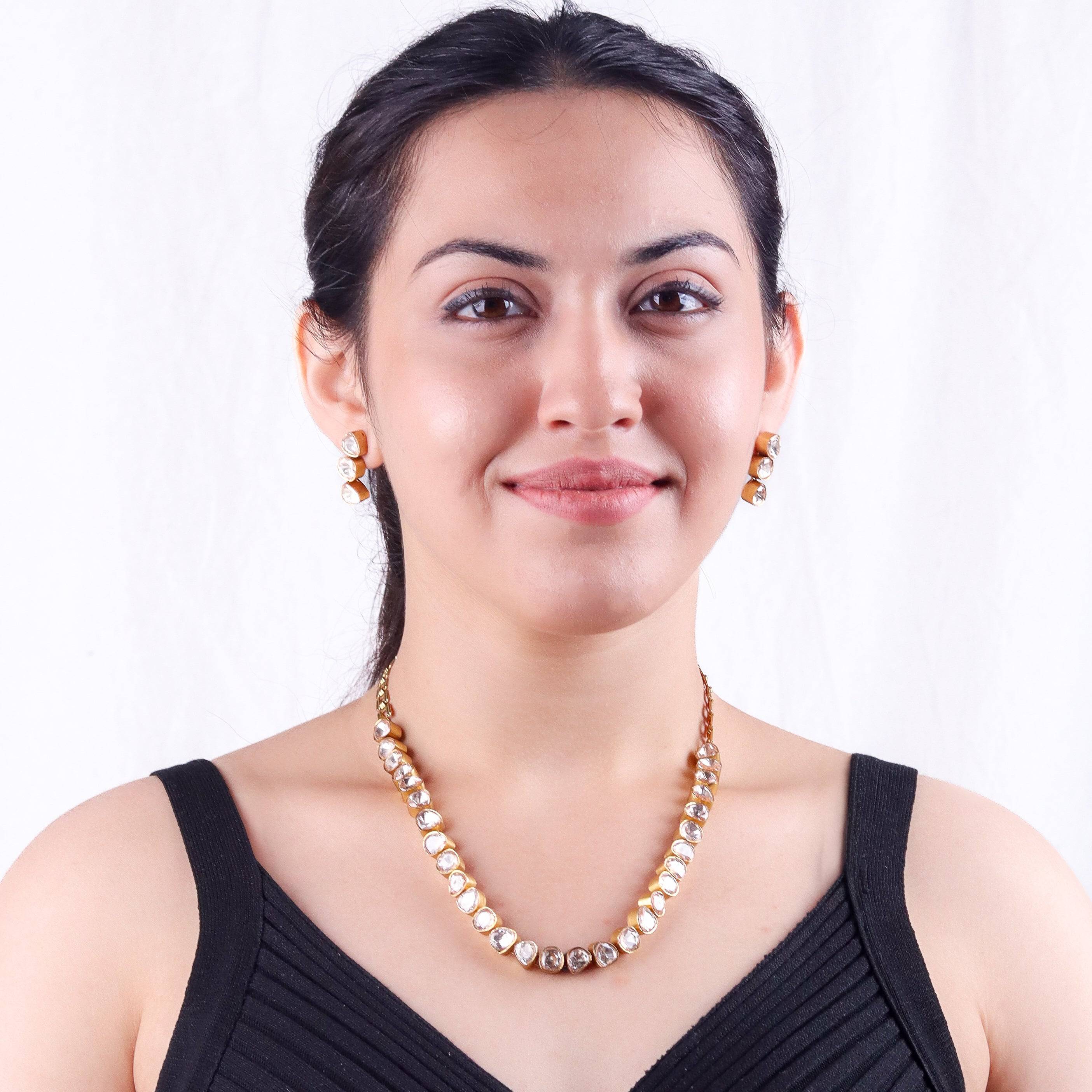 Model wearing 22K gold-plated fashion Set for a sophisticated and elegant jewelry look