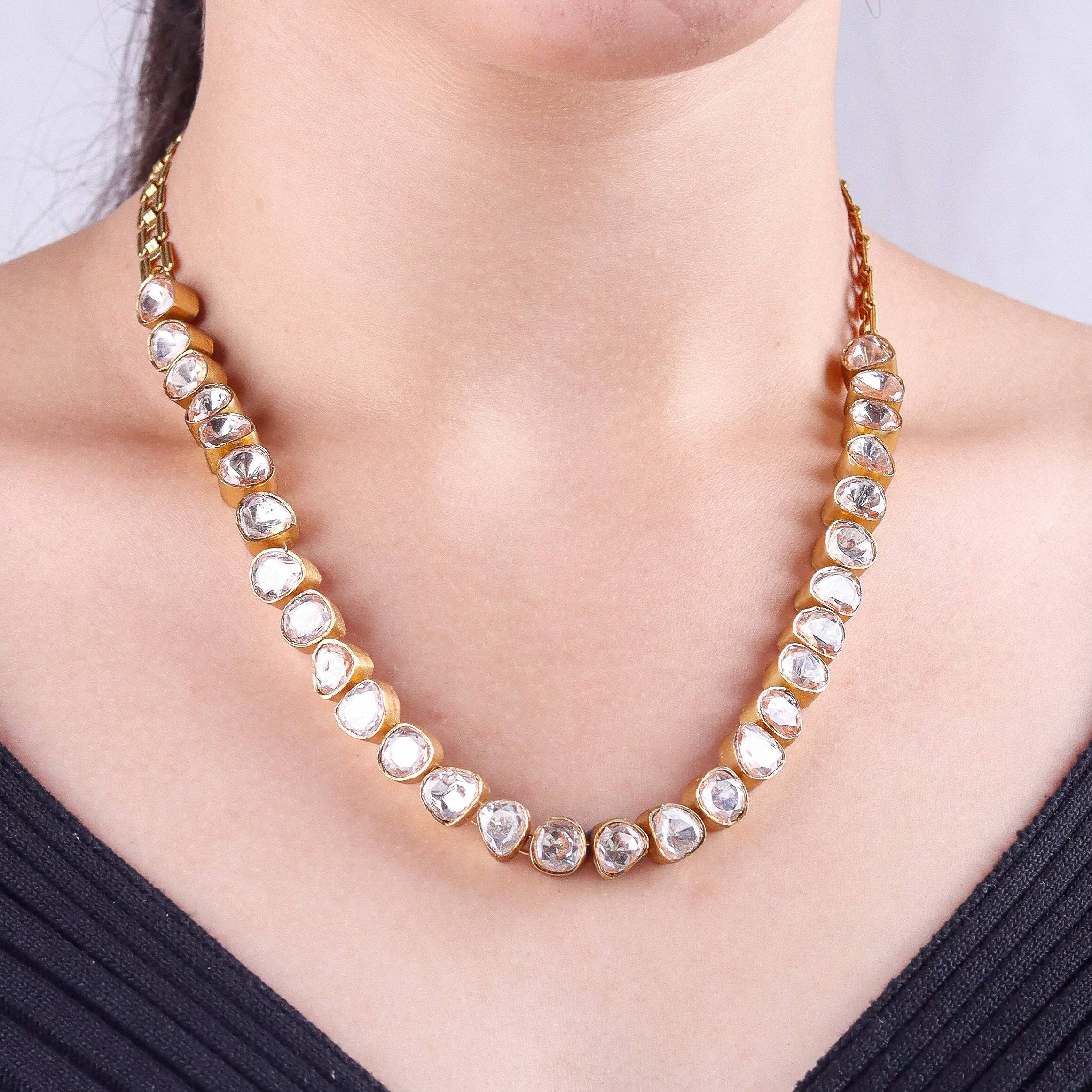 Model wearing 22K gold-plated fashion Set for a sophisticated and elegant jewelry look