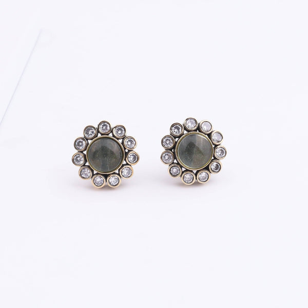 Close-up of Brass Fashion Earrings showcasing intricate detailing, textured elements, and fine craftsmanship