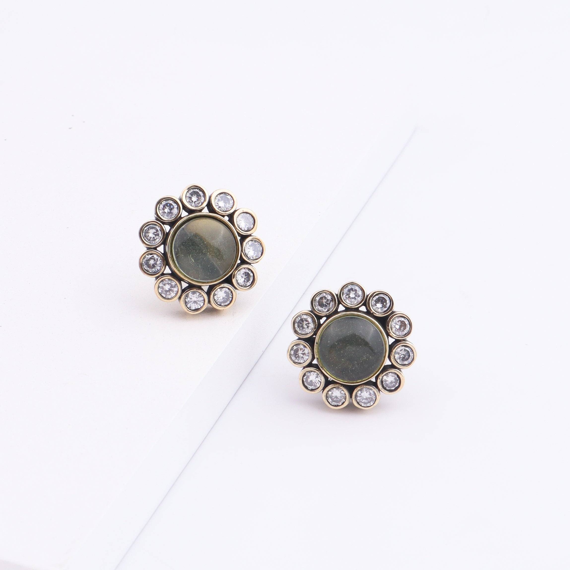 Detailed view of Brass Fashion Earrings highlighting intricate motifs, textured surface, and refined brass finish