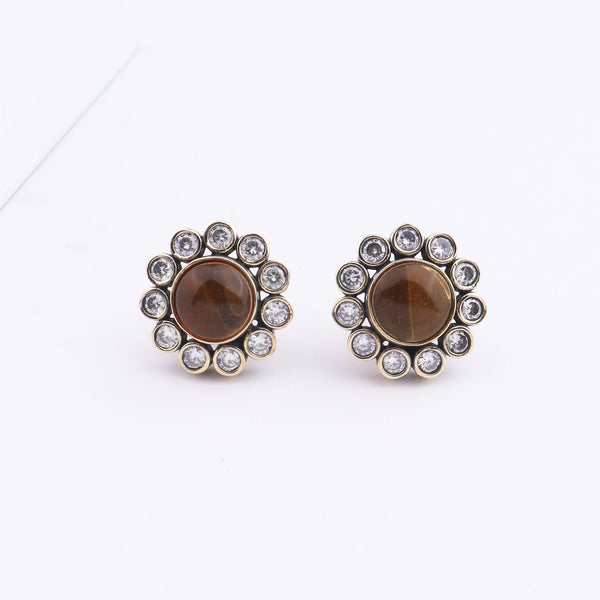 Close-up of Brass Fashion Earrings showcasing intricate detailing, textured elements, and fine craftsmanship