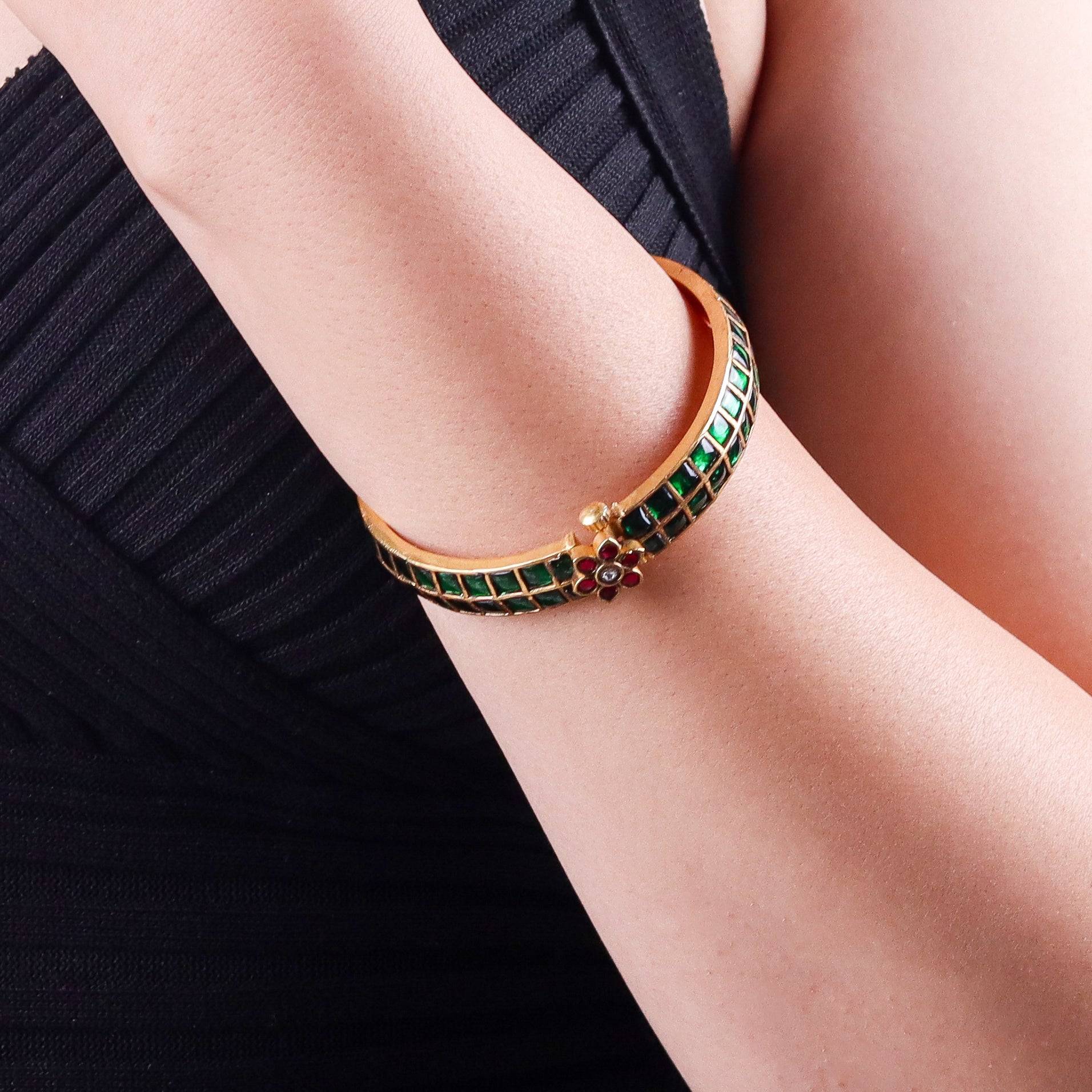 Model wearing a 22K gold-plated fashion bangle (single) for a sophisticated and elegant jewelry look