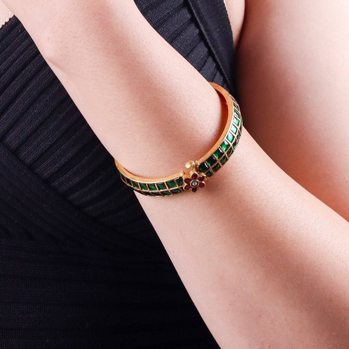 Model wearing a 22K gold-plated fashion bangle (single) for a sophisticated and elegant jewelry look
