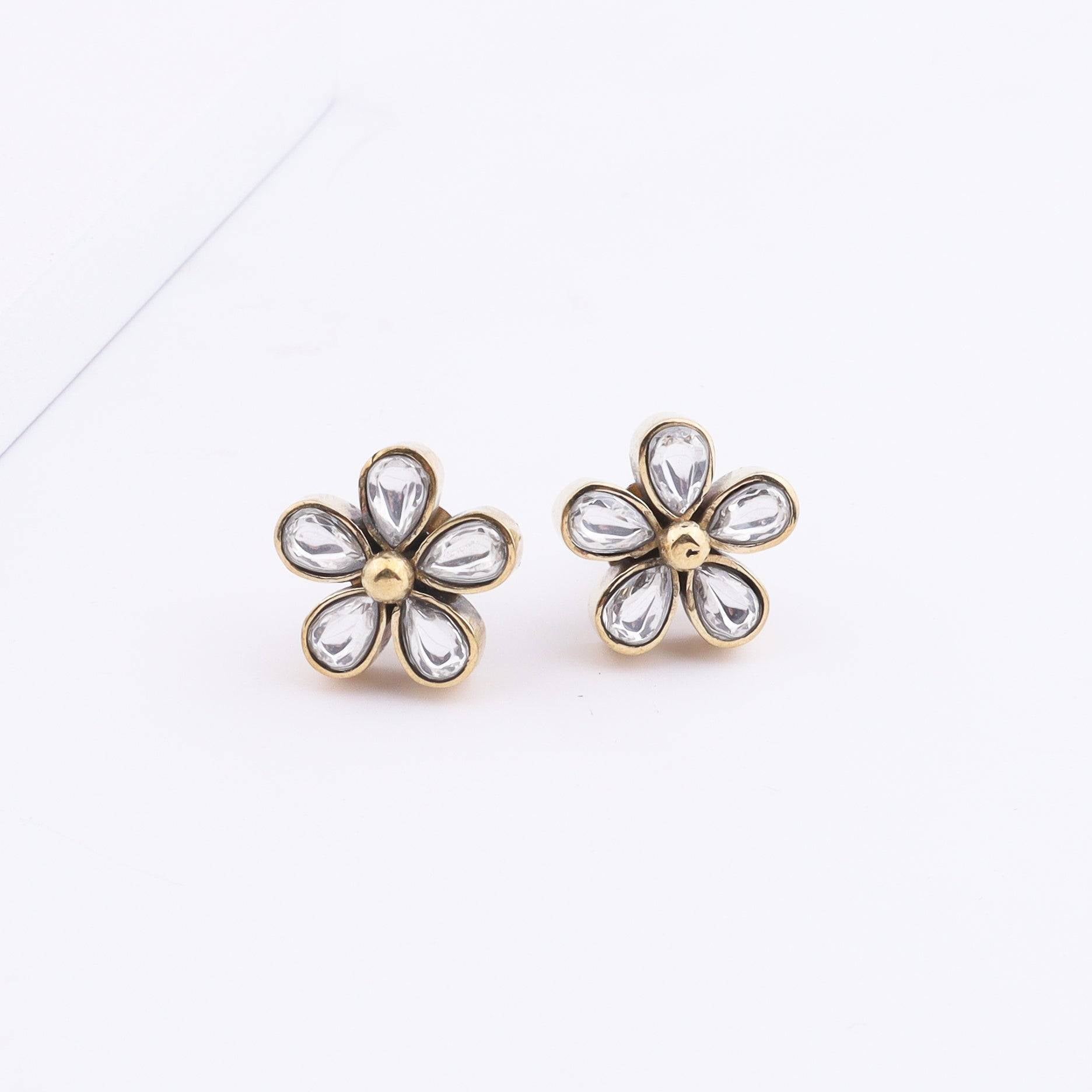 Close-up of Brass Fashion Earrings showcasing intricate detailing, textured elements, and fine craftsmanship