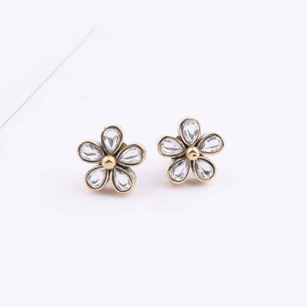 Close-up of Brass Fashion Earrings showcasing intricate detailing, textured elements, and fine craftsmanship