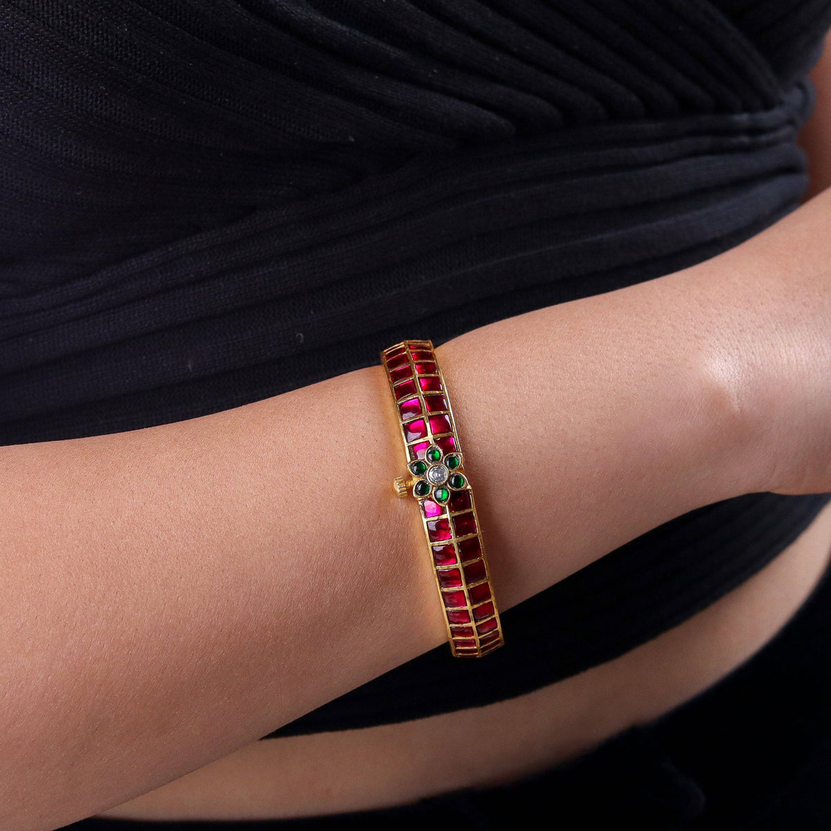 Model wearing a 22K gold-plated fashion bangle (single) for a sophisticated and elegant jewelry look