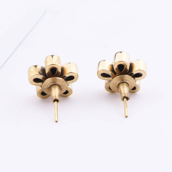 Angled view of Brass Fashion Earrings highlighting the unique silhouette, structure, and polished brass finish