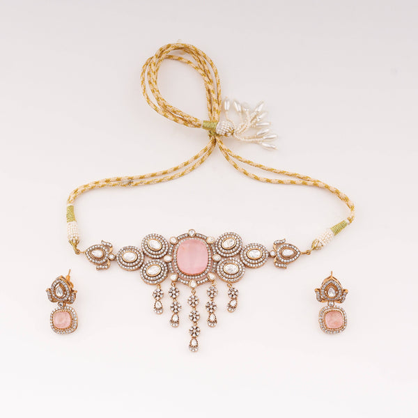 Detailed view of 22K gold-plated fashion set highlighting intricate motifs, textured detailing, and premium 22K gold-plated finish