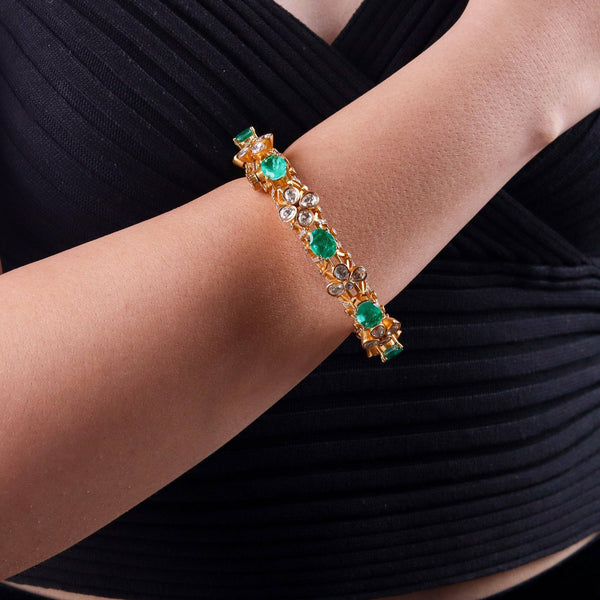 Model wearing 22K gold-plated fashion bangle (single) for a sophisticated and elegant jewelry look