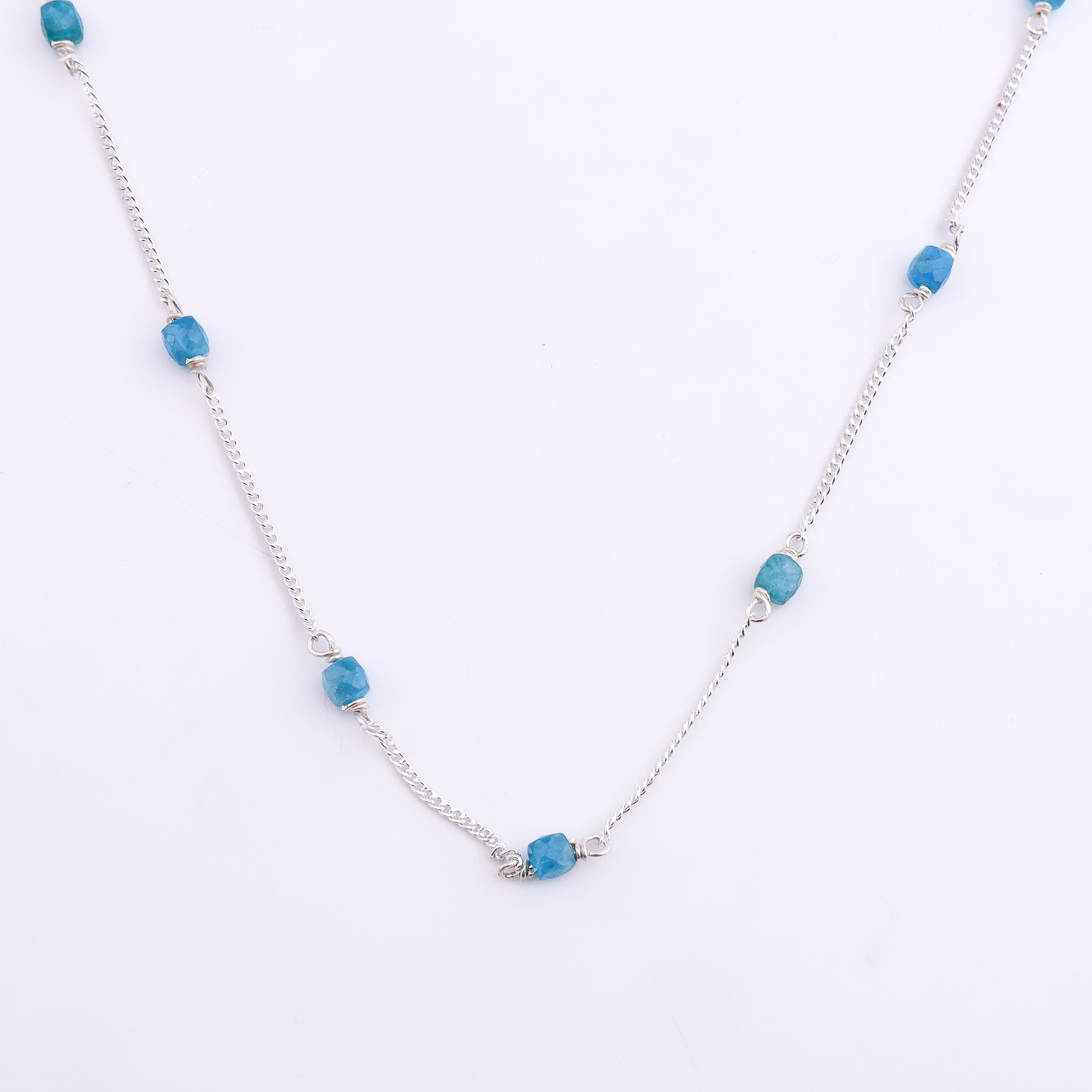 Silver chain with blue apatite beads