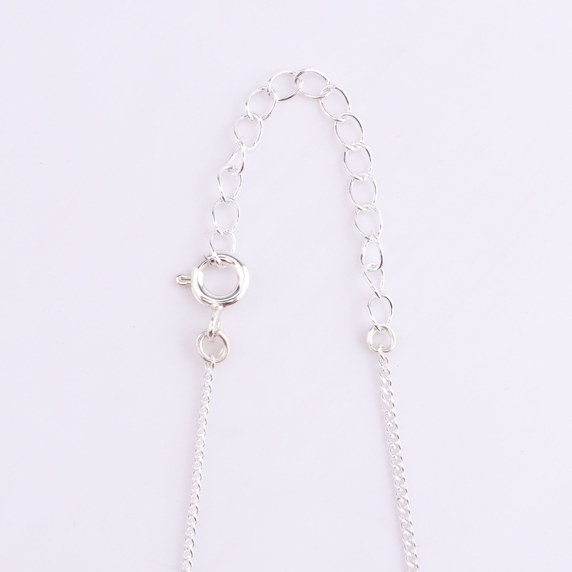 Silver chain with blue apatite gemstone detail