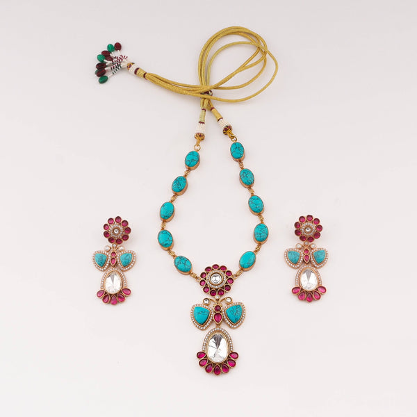 Detailed view of a 22K gold-plated fashion set highlighting intricate motifs, textured detailing, and a premium 22K gold-plated finish