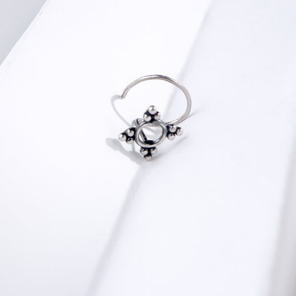 Minimal silver nose pin with floral design for everyday elegance