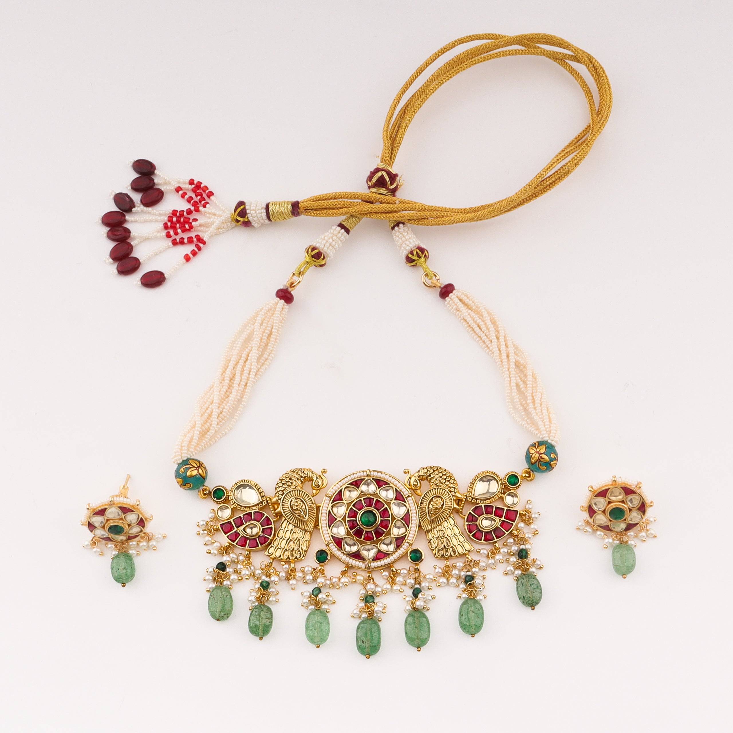 Detailed view of 22K gold-plated fashion set highlighting intricate motifs, textured detailing, and premium 22K gold-plated finish