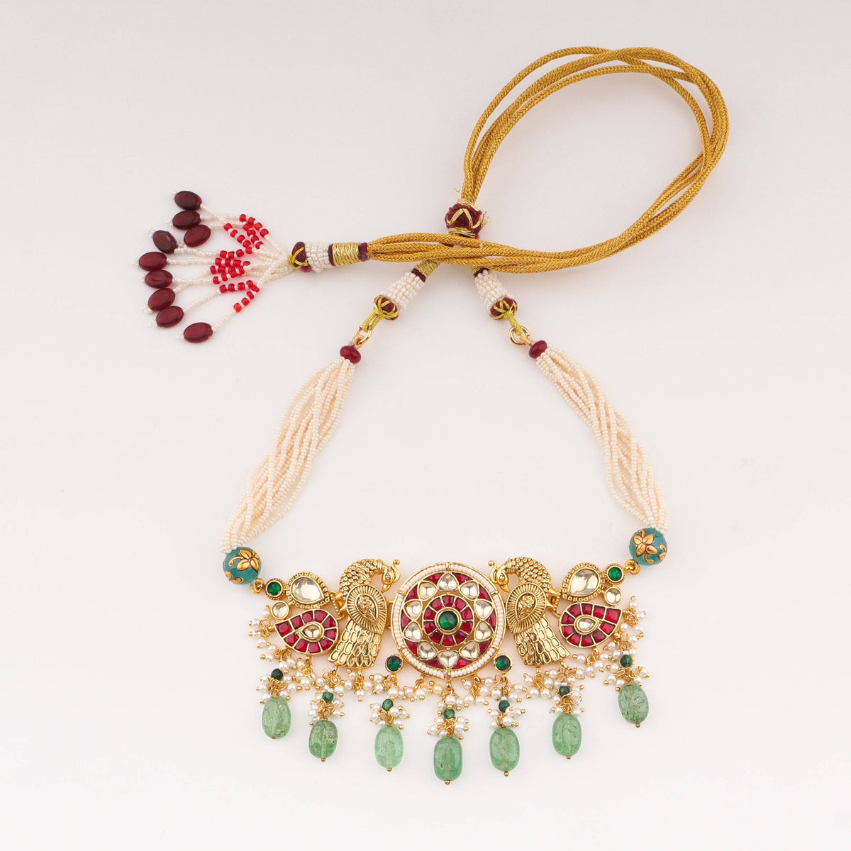 Detailed view of 22K gold-plated fashion set highlighting intricate motifs, textured detailing, and premium 22K gold-plated finish