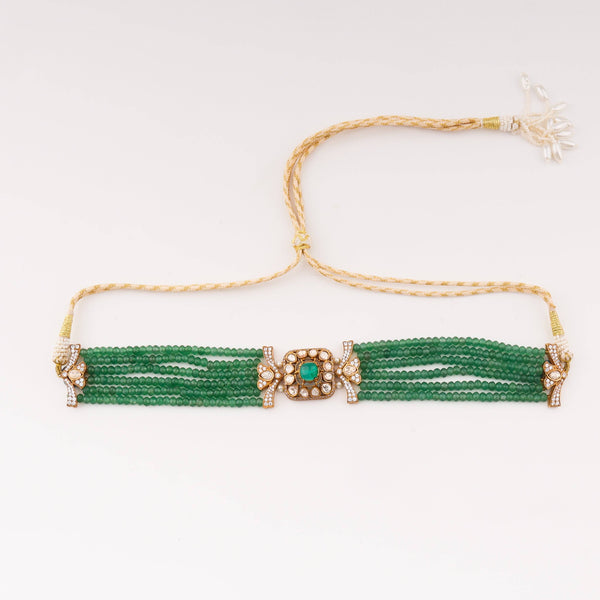 Detailed view of 22K gold-plated fashion set highlighting intricate motifs, textured detailing, and premium 22K gold-plated finish