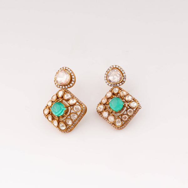 Angled view of 22K gold-plated fashion set highlighting its coordinated design, elegant structure, and polished gold finish