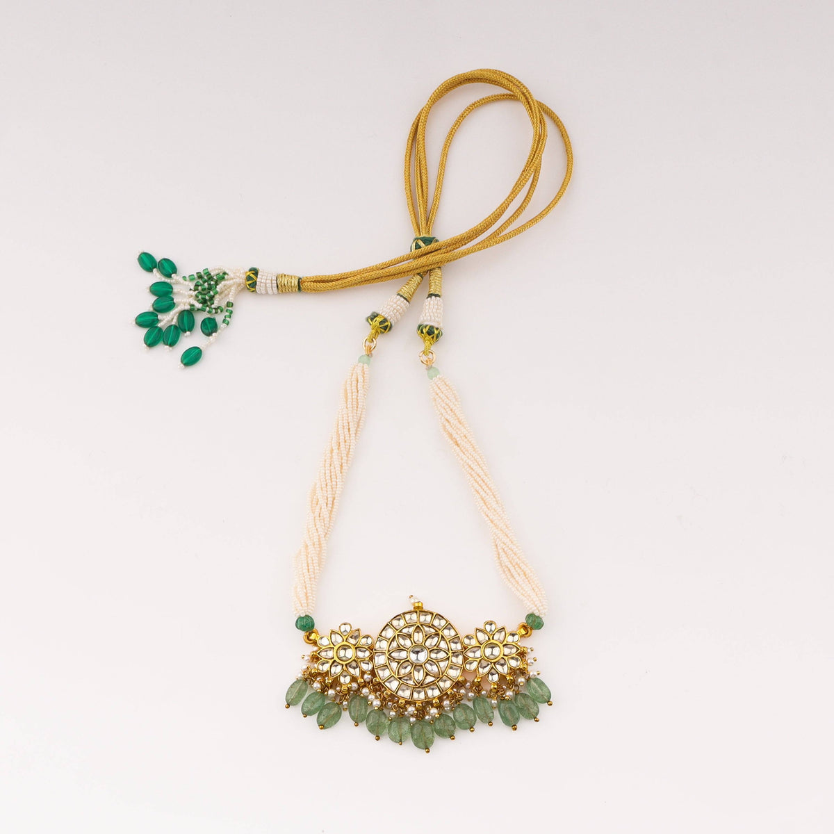 Detailed view of 22K gold-plated fashion sets highlighting intricate motifs, textured detailing, and premium 22K gold-plated finish