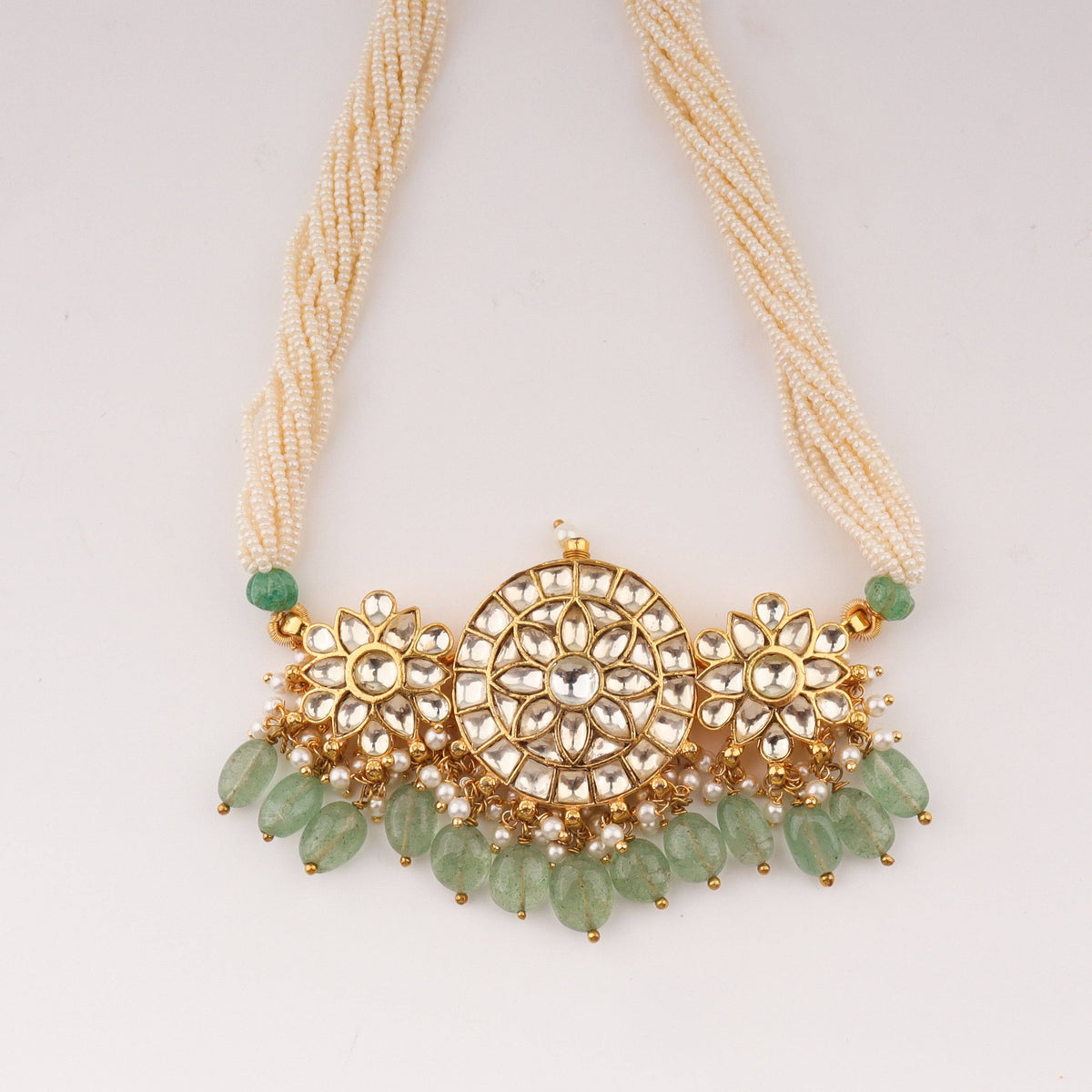 Close-up of 22K gold-plated fashion sets showcasing intricate detailing, fine craftsmanship, and rich 22K gold plating
