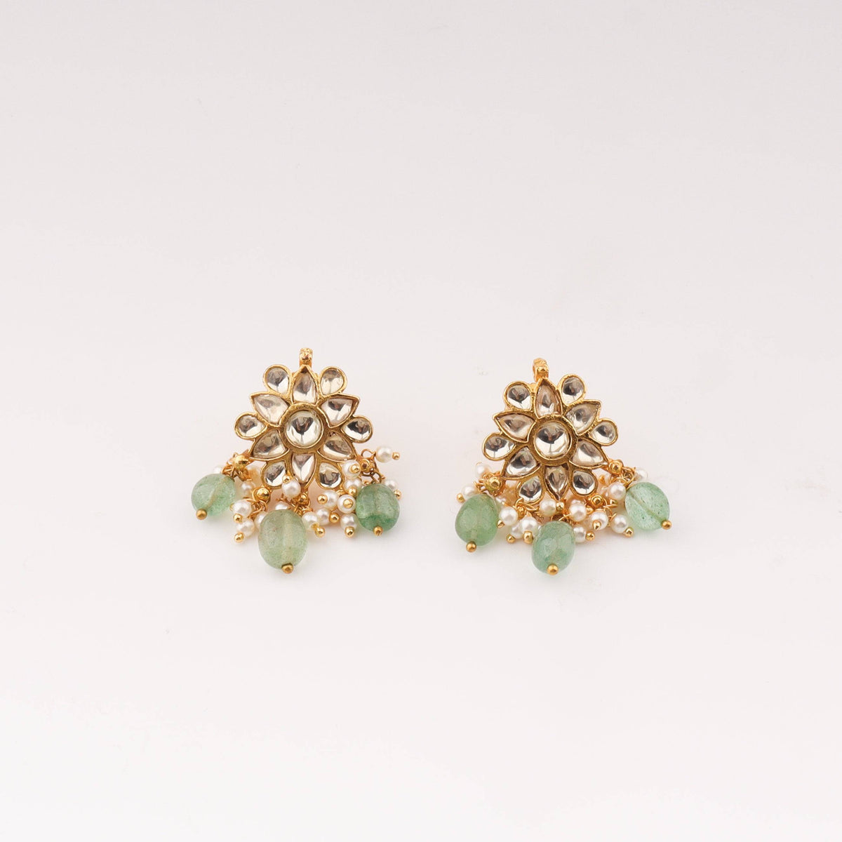 Close-up of 22K gold-plated fashion sets showcasing intricate detailing, fine craftsmanship, and rich 22K gold plating