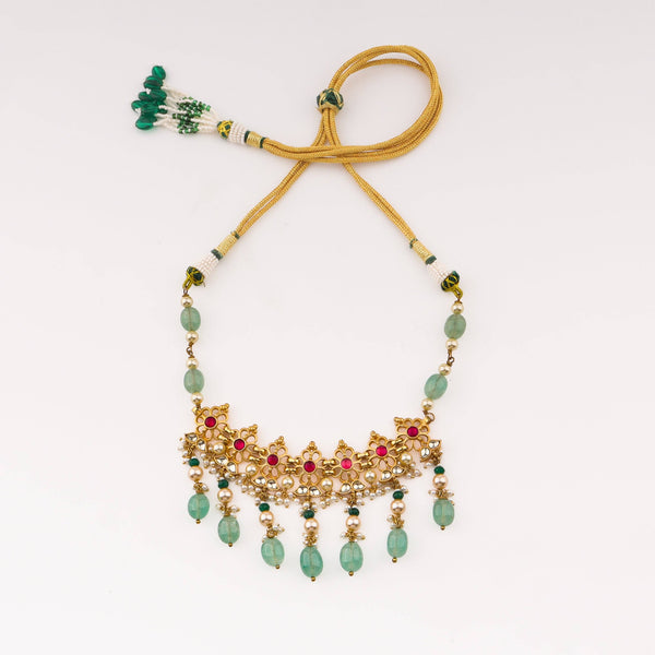Flat-lay of 22K Gold-Plated Fashion Set with complementary gold-plated jewelry and elegant festive accessories