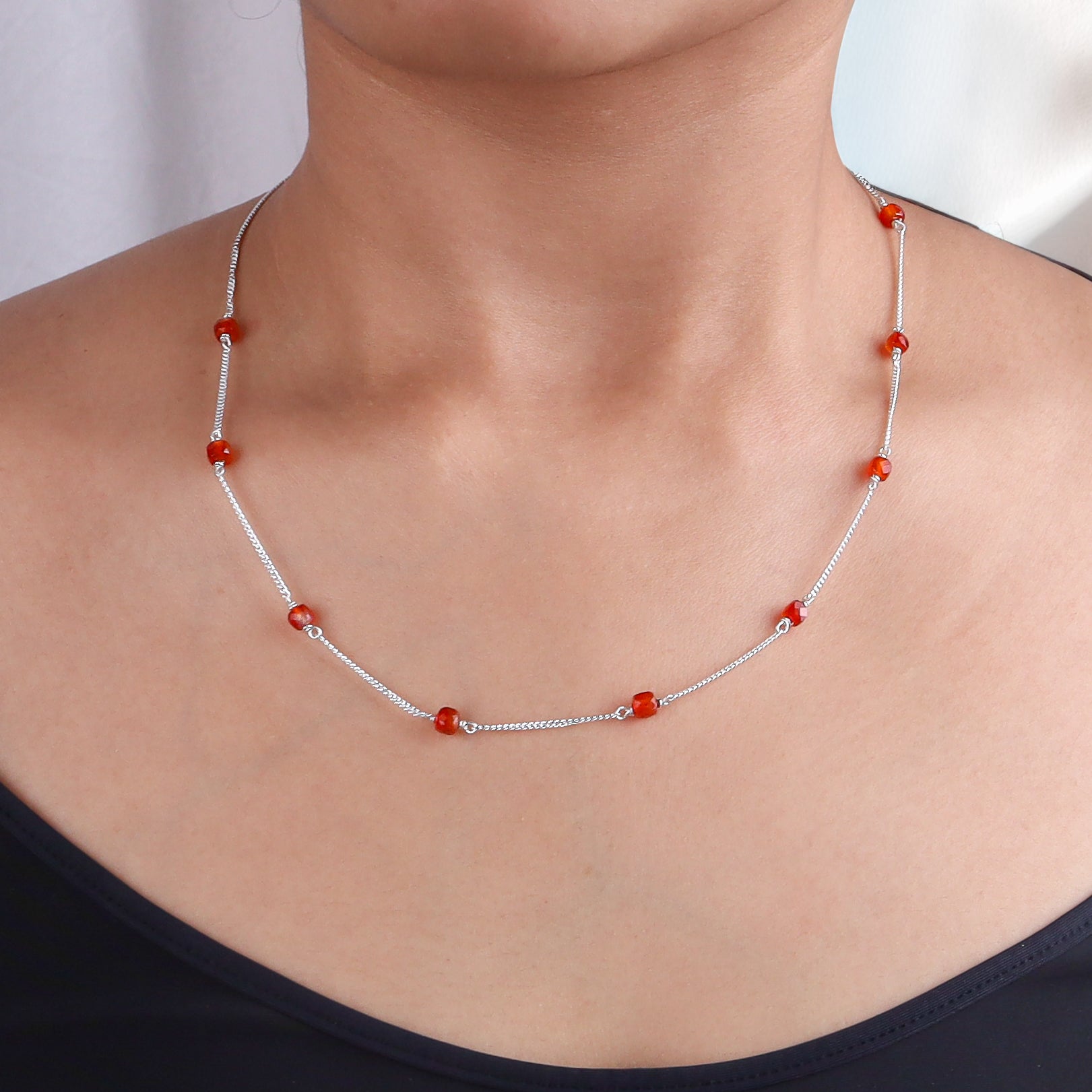 Neck and collarbone view of silver Carnelian Chain necklace
