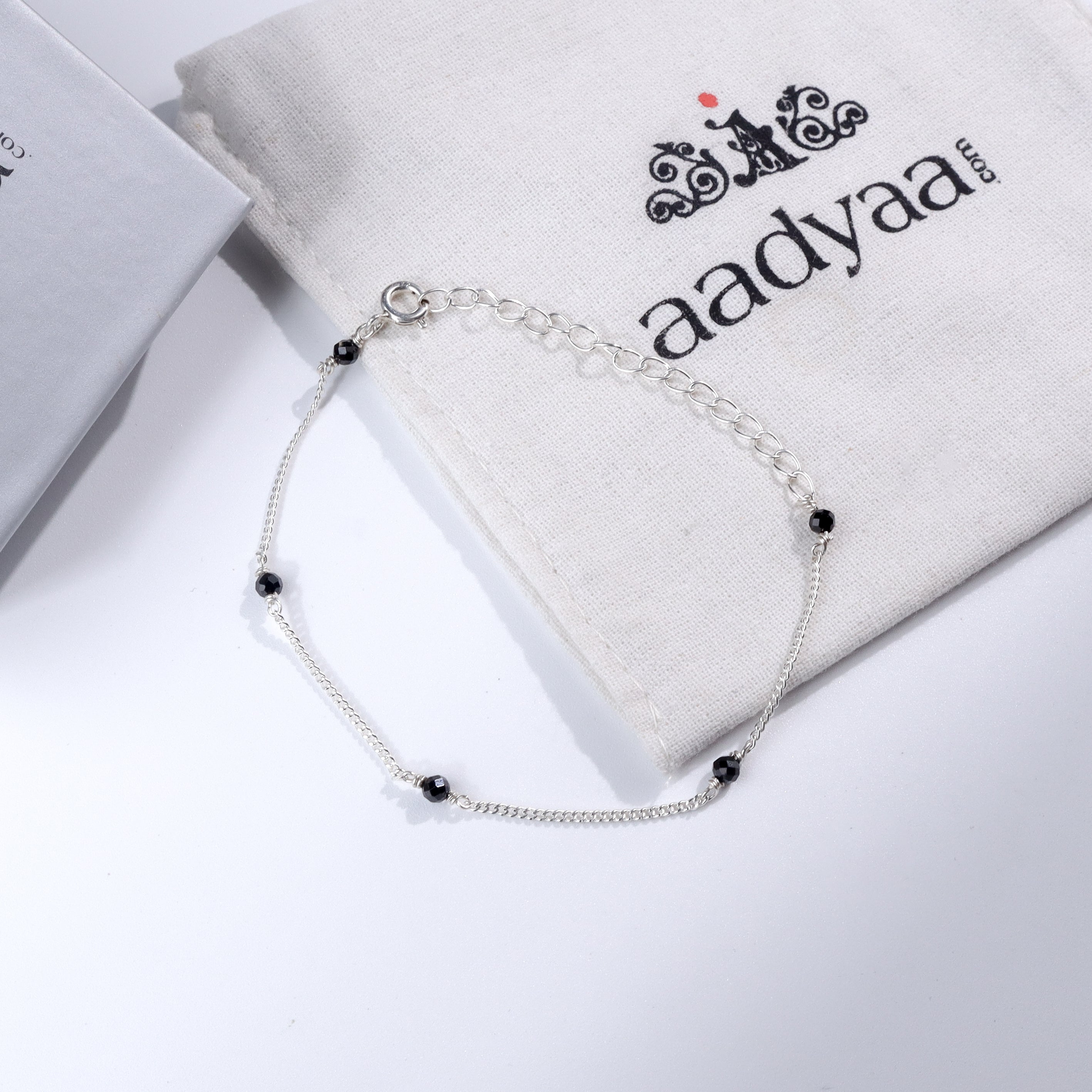 Black Spinel Silver Anklet on white background