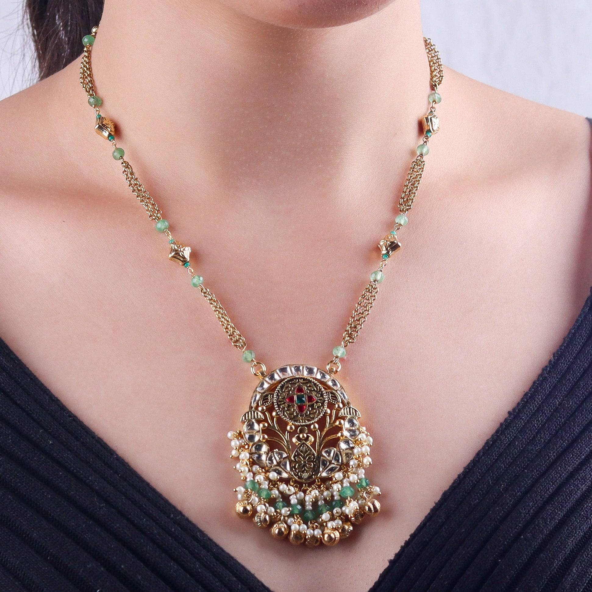 Model wearing 22K gold-plated fashion Set for a sophisticated and elegant jewelry look