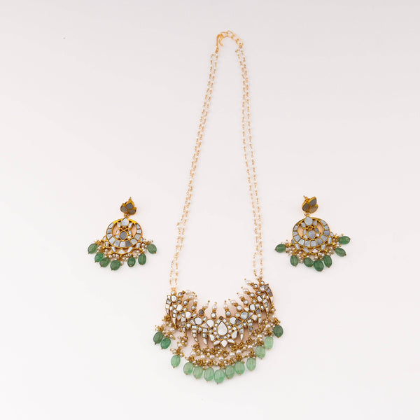 Detailed view of the 22K gold-plated fashion set highlighting intricate motifs, textured detailing, and a premium 22K gold-plated finish
