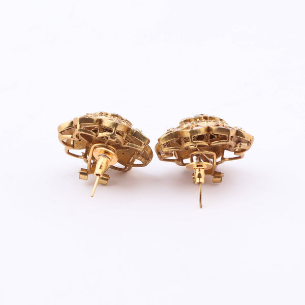 Angled view of Brass Fashion Earrings highlighting the unique silhouette, structure, and polished brass finish