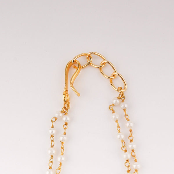 Angled view of the 22K gold-plated fashion set highlighting its coordinated design, elegant structure, and polished gold finish