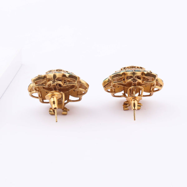 Angled view of Brass Fashion Earrings highlighting the unique silhouette, structure, and polished brass finish