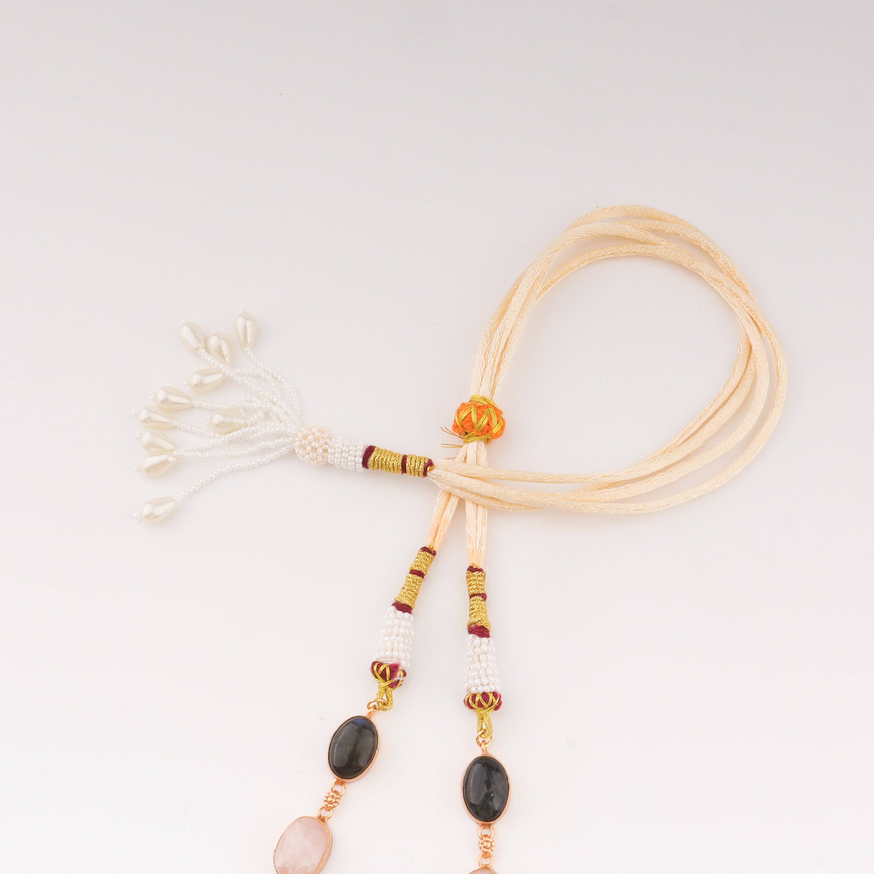 Angled view of a 22K gold-plated fashion set highlighting its coordinated design, elegant structure, and polished gold finish