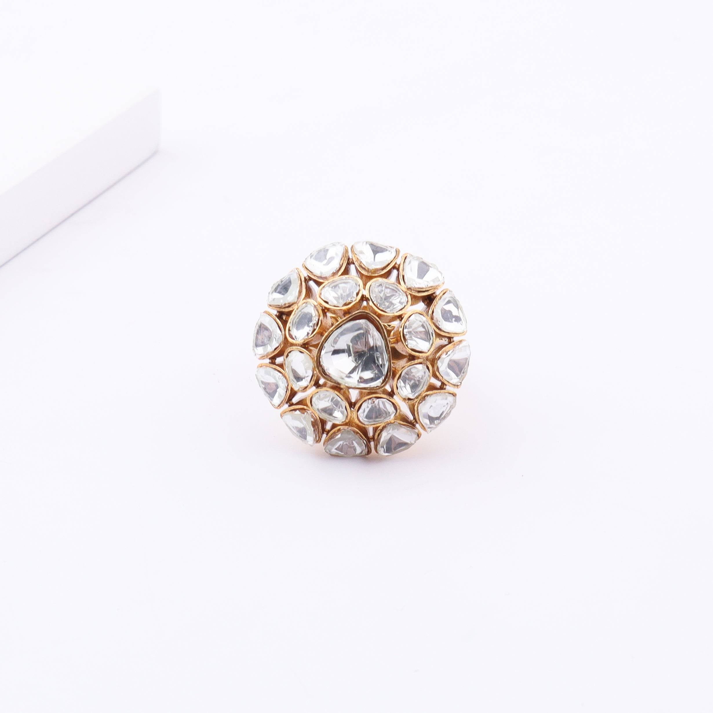 Detailed view of Brass Fashion Ring highlighting intricate motifs, textured surface, and refined brass finish
