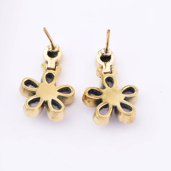 Flat-lay of Brass Fashion Earrings with complementary jewellery and accessories for a chic styling setup