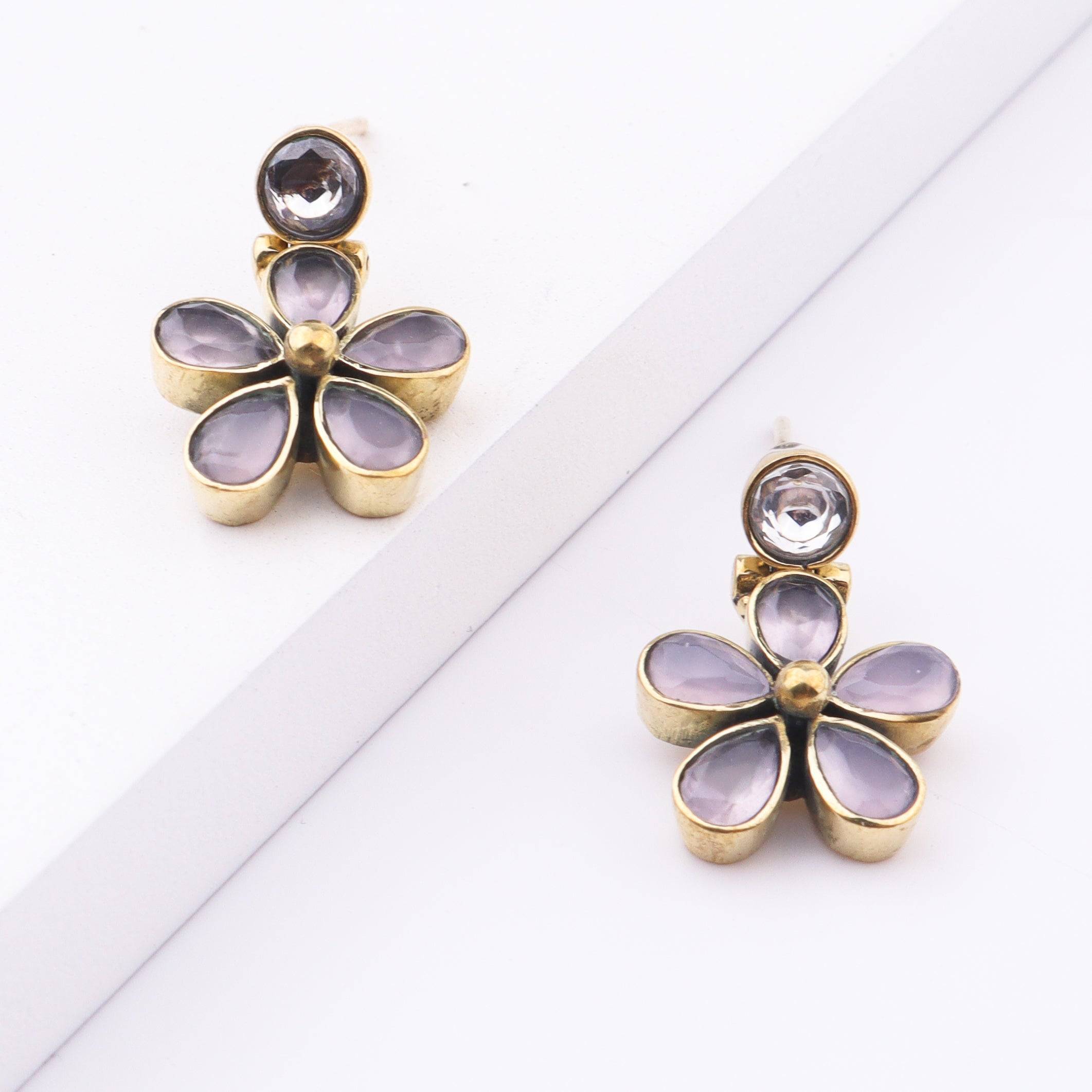 Angled view of Brass Fashion Earrings highlighting the unique silhouette, structure, and polished brass finish