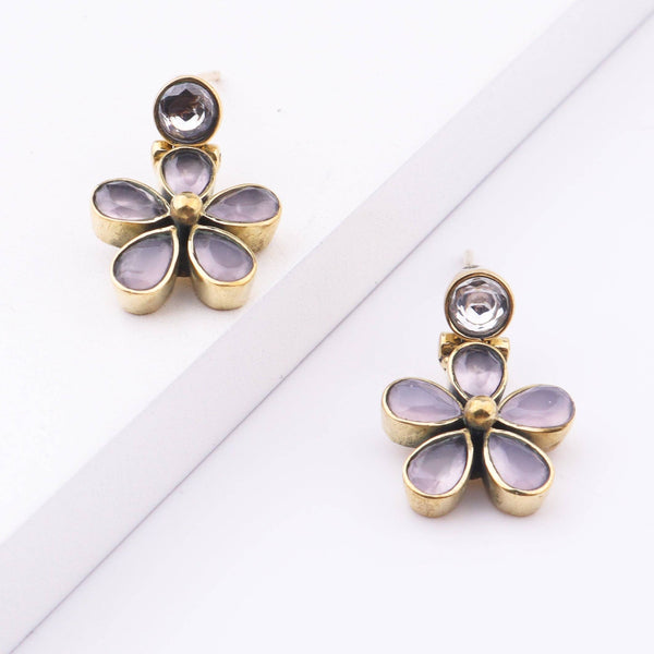 Angled view of Brass Fashion Earrings highlighting the unique silhouette, structure, and polished brass finish