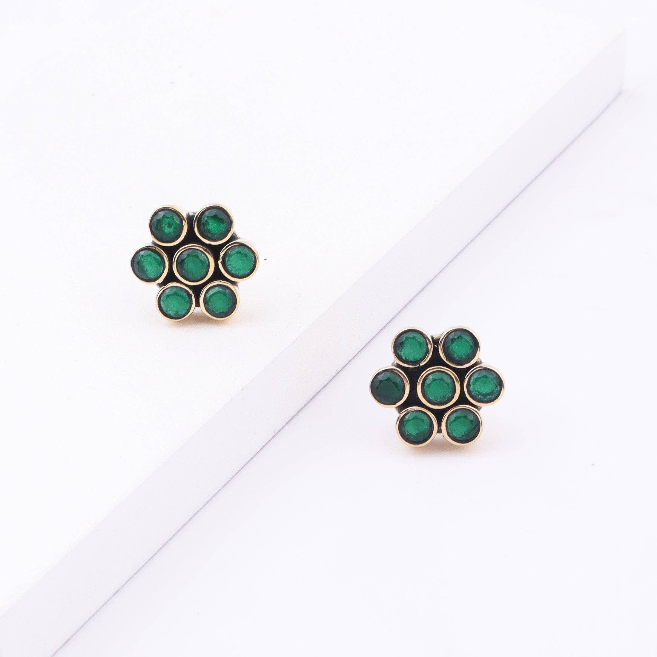 Detailed view of Brass Fashion Earrings highlighting intricate motifs, textured surface, and refined brass finish