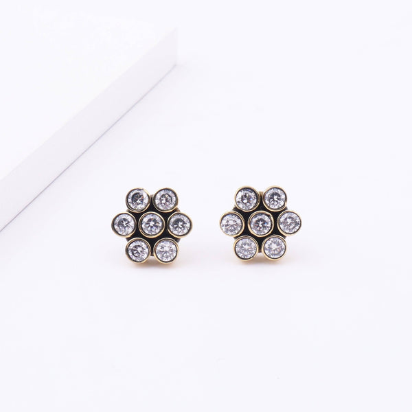 Detailed view of Brass Fashion Earrings highlighting intricate motifs, textured surface, and refined brass finish