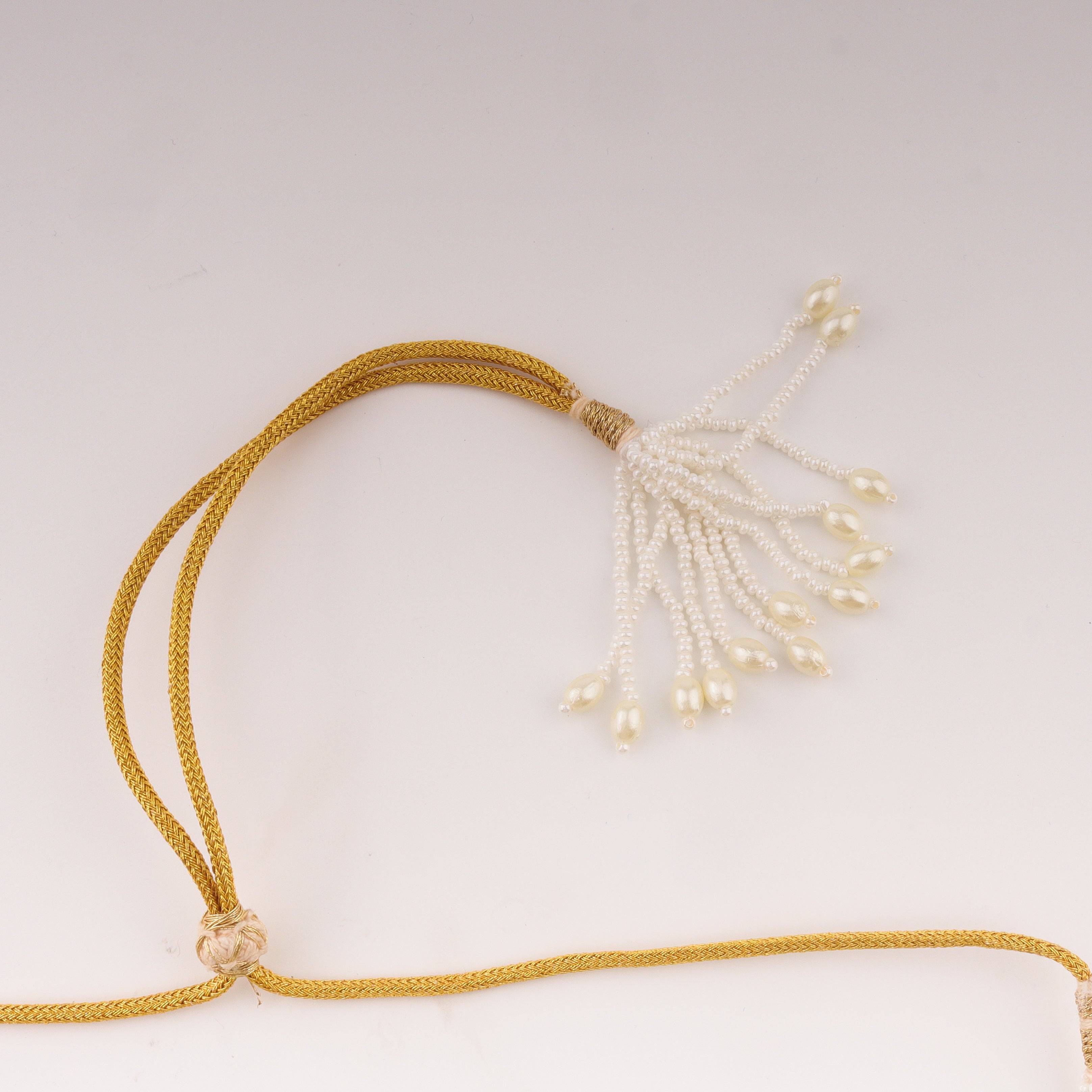 Angled view of a 22K gold-plated fashion necklace highlighting its elegant structure, design, and polished gold finish