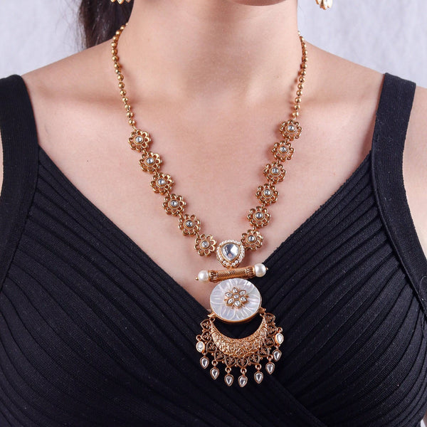 Model wearing 22K gold-plated fashion Set for a sophisticated and elegant jewelry look