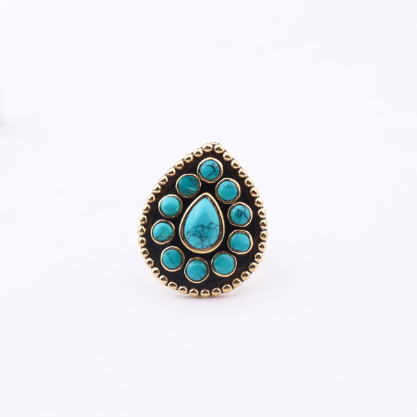 Close-up of a brass fashion ring showcasing intricate detailing, unique design, and fine craftsmanship