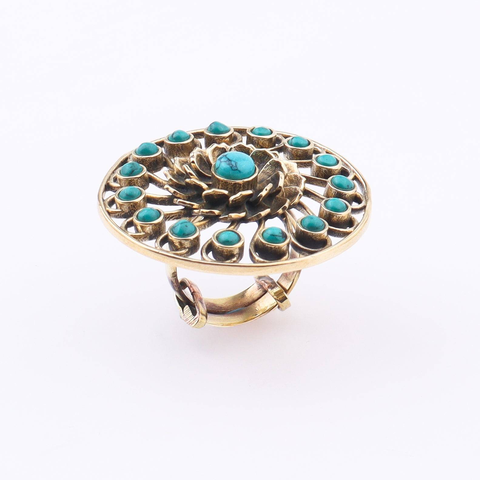 Detailed view of Brass Fashion Ring highlighting intricate motifs, textured surface, and refined brass finish