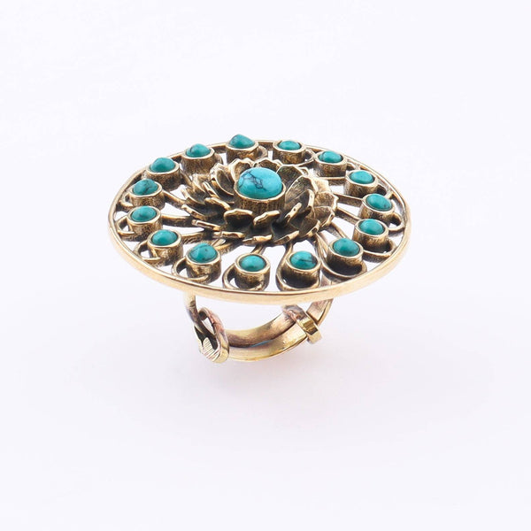 Detailed view of Brass Fashion Ring highlighting intricate motifs, textured surface, and refined brass finish