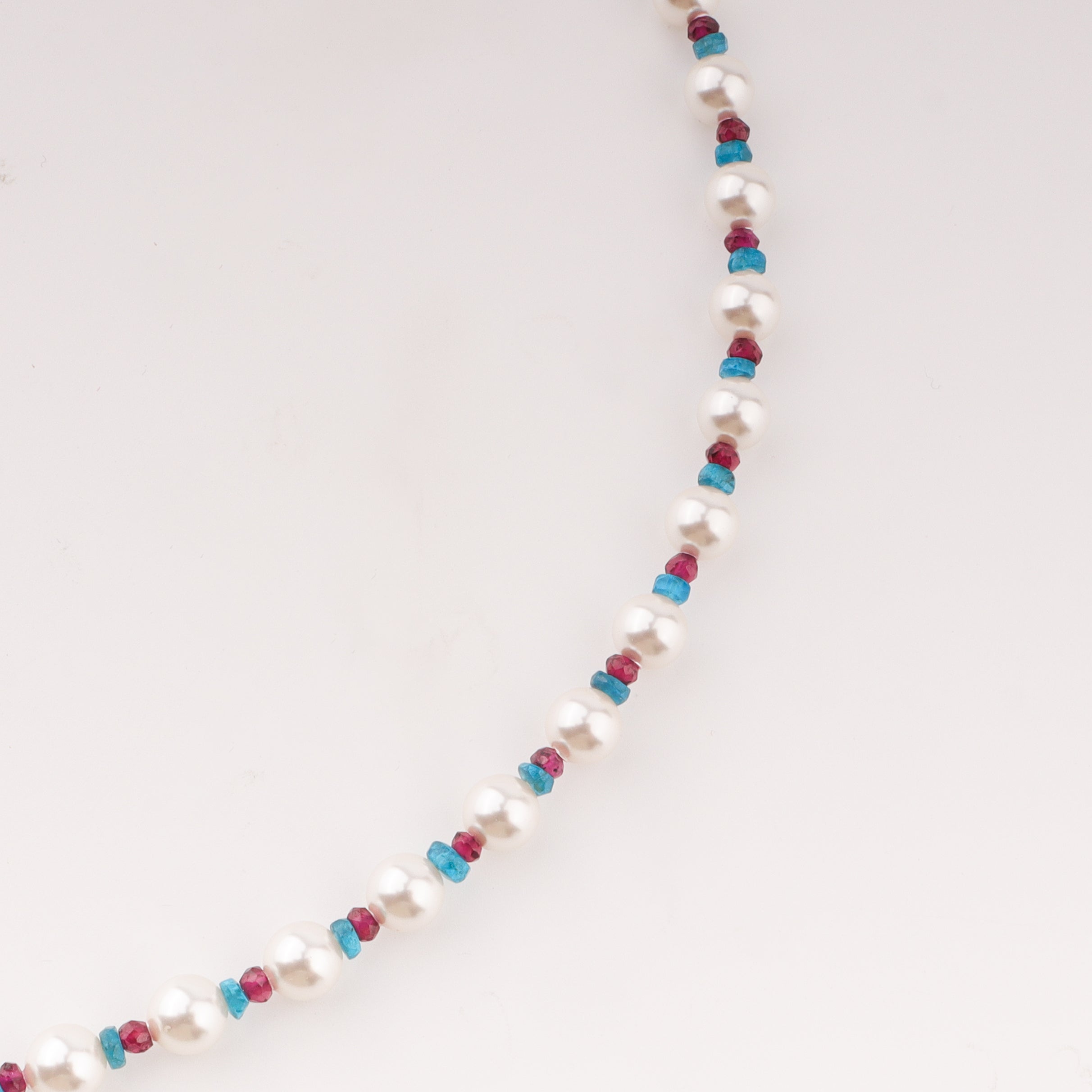 Infinity lock necklace with pearls and semipricious stones