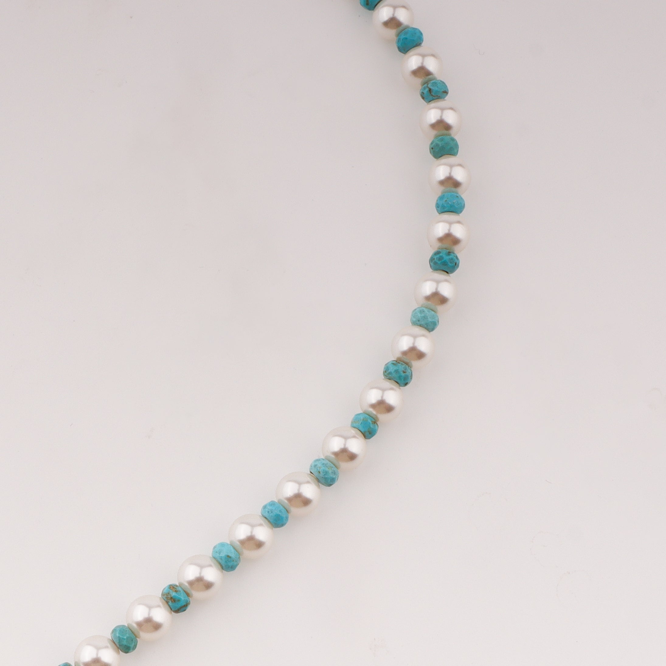 Infinity lock necklace with pearls and terquoise