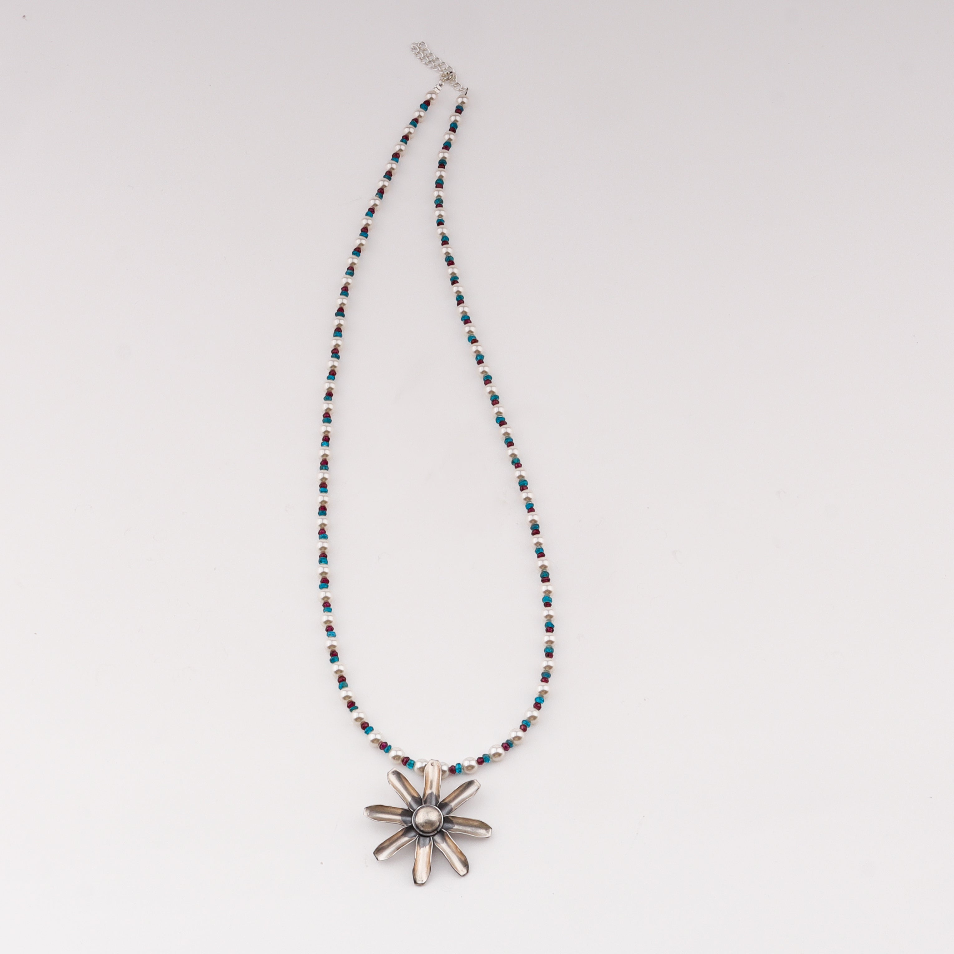 Flower pendant necklace with pearls and semipricious stones